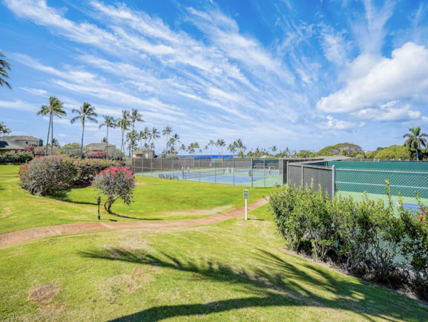 Luxury Poipu Kauai Vacation Rental  Ocean View Top-Floor Condo Near Brennecke’s Beach